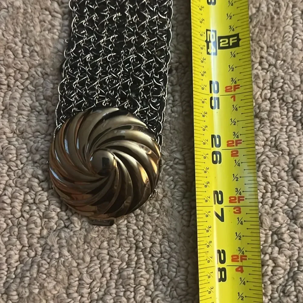 Metallic black and gold woven belt with metal buckle